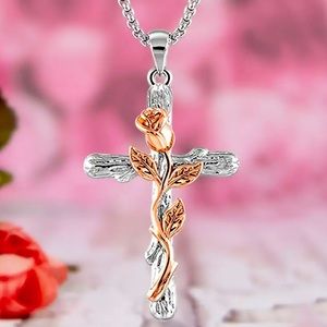 NWT—-Rose Gold winding Rose on silver cross necklace, stunning piece.